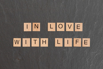 In Love With Life Written With Game Tiles
