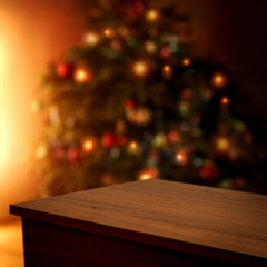 Naklejka na ściany i meble Wooden corner table of free space for your decoration and blurred christmas tree 
