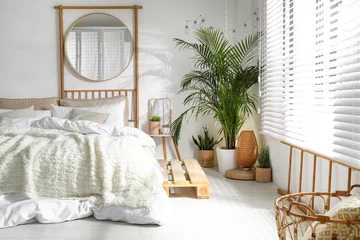 Fotobehang Boho Stylish modern room interior with  comfortable bed  © New Africa