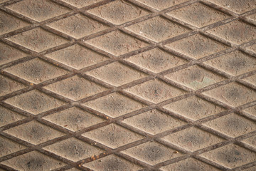 patterned iron sheet. Texture, background, old, concrete, shabby, wallpaper, backdrop, rusty background. Brown texture