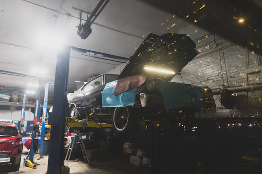 Classic Muscle Car Getting Repairs In A Garage