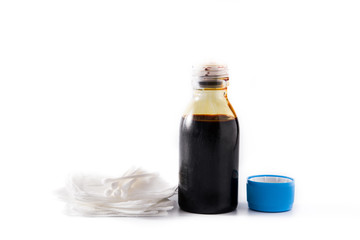 Medical iodine in a bottle and gauzes isolated on white background