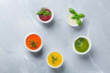 Set of seasonal fall autumn creamy soups on a table