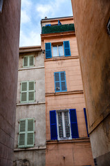 Narrow street in the old town of Marseille. Vertical.