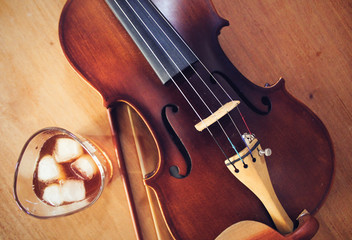 Violin and whiskey and music turns any violin into a fiddle.
