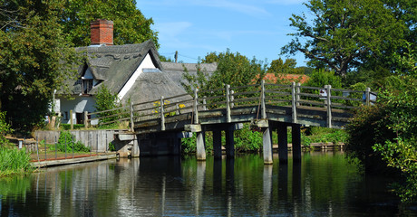 Fototapeta na wymiar Pretty little bridge on the river Stour near Flatford Mill East Bergholt Suffolk.