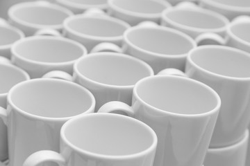 White caramic mugs pattern, close-up view