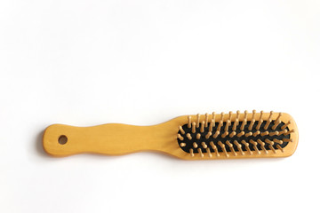 wooden hair comb on white background beauty concept, zero waste no plastic and hair salon, copyscape
