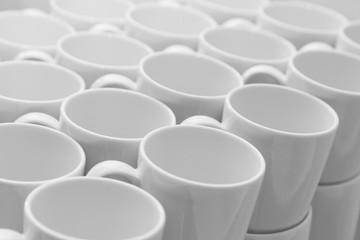 White caramic mugs pattern, close-up view