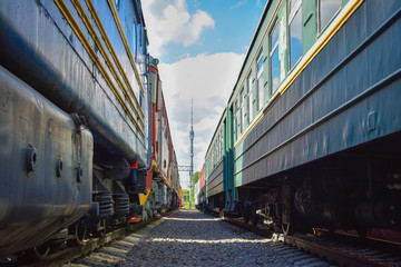 Obraz premium Ostankino tower between two old trains