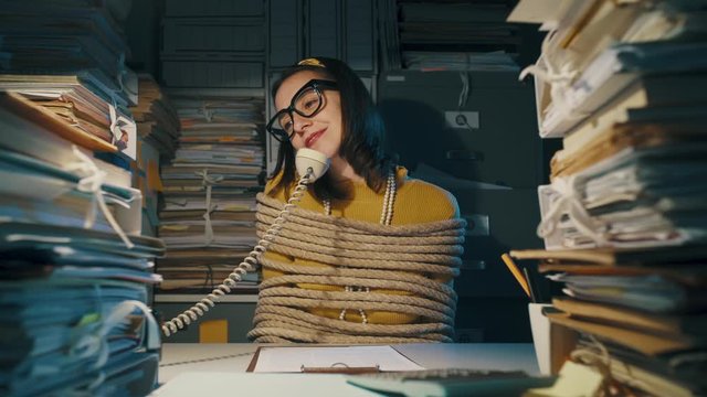 Businesswoman tied up in the office
