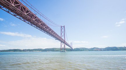 Stunning pictures of the Ponte 25 de Abril bridge - Over 2km-long, this striking Golden Gate-style bridge links Lisbon with Almada in Portugal. 