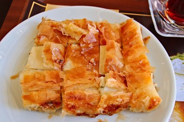 Traditional Turkish baklava on a white plate. 