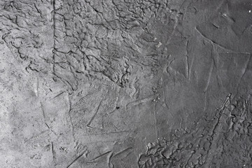gray concrete background with bumps, marks from trowel