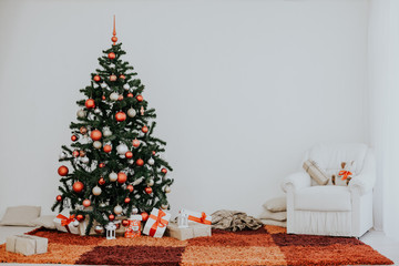Christmas tree on new year's Eve in a white room with Christmas gifts
