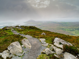 Path on top of Diamond hill, Connemara National park, county Galway Ireland. Cloudy sky, Nobody.