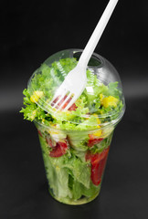 Greek salad on a black background