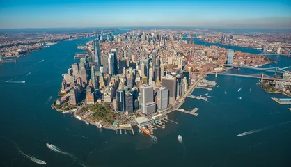 Foto op Plexiglas Aerial view to New York City Skyline from helicopter. © elena_suvorova