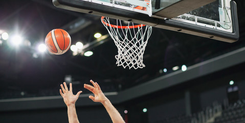 scoring during a basketball game ball in hoop © Melinda Nagy