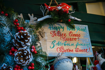 Different decoration, toy for xmas tree on christmas market, close up of cozy handmade toys