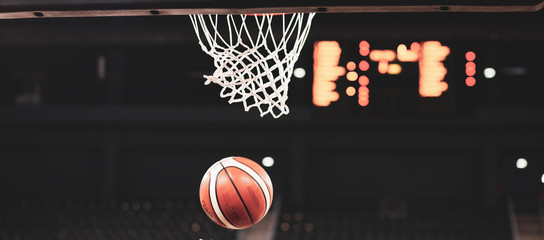 scoring during a basketball game ball in hoop © Melinda Nagy