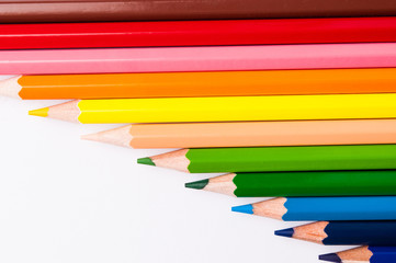 color pencils on a white background