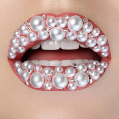 close up lips with perls
