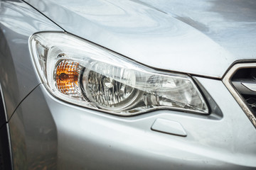 Car Headlight lamp in close up. Modern transport