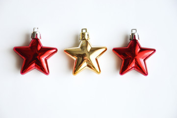 Fototapeta premium Christmas toys on a white background. Decorations for the holiday. Preparation for the New year and Christmas. Toys for decor.