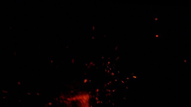Slow motion flame with amazing flying embers. Real footage with beautiful flame detail, filmed in slow motion
