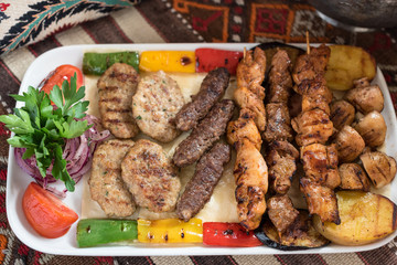 Middle Eastern Style Assorted Grilled Meat, Kebabs, Beef, Lamb, Chicken and Vegetables.