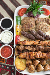 Middle Eastern Style Assorted Grilled Meat, Kebabs, Beef, Lamb, Chicken and Vegetables.