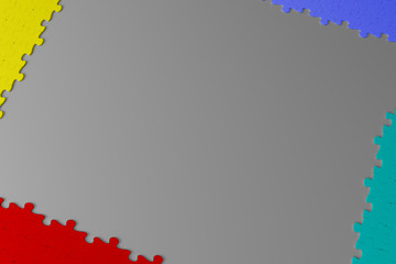 Obraz premium Different color jigsaw puzzle pieces in a frame overlay.