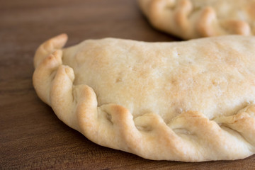 Food photography of an ovenbaked empanada