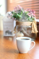cup of coffee with flowers