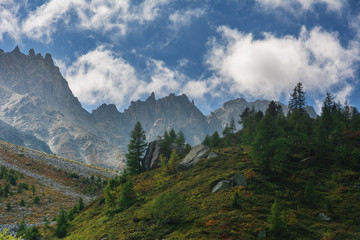 Fototapeta premium Wonderful views of the mountains in the Swiss Alps with backpackers.