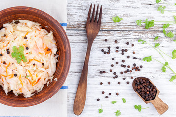 Fermented Preserved Vegetarian Food. Homemade Marinated Cabbage, Sauerkraut Sour In Wooden Bowl On Rustic Fabric Towel On Wooden Kitchen Table