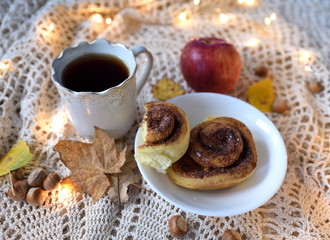 Cozy fall composition with cinnamon rolls and tea, autumn flatlay with copy space