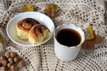 Cozy fall composition with cinnamon rolls and tea, autumn flatlay with copy space