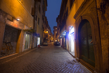 Fototapeta na wymiar Trastevere district by dusk in Rome Italy on February 8, 2017