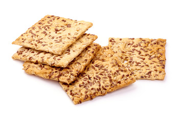 Crispy crackers with sesame and flax seeds, isolated on white background