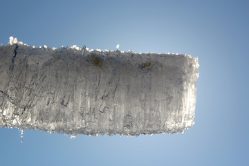 layer of ice surrounded by blue sky