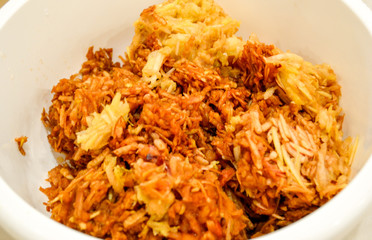 Apples grated on a grater appetizing looking brown juicy apples. Natural homemade food