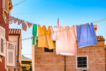 Colorful laundry drying on clothesline in the old town of Dubrovnik in Croatia