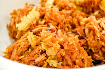 Apples grated on a grater appetizing looking brown juicy apples. Natural homemade food