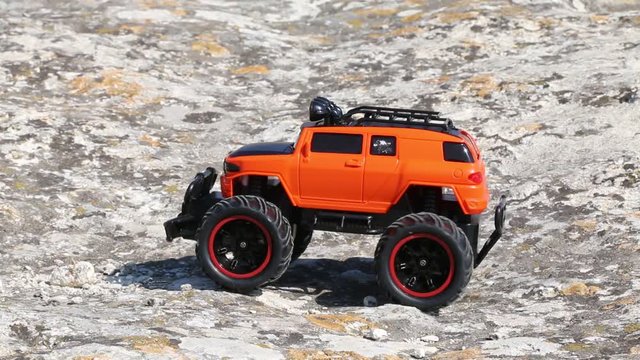 toy rc car riding on a cliff