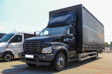 Naklejka na ściany i meble cargo truck with awning for cargo transportation