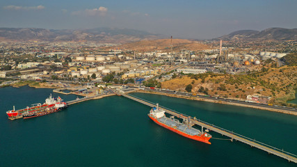 Aerial drone photo of industrial refinery of Hellenic Public Petroleum company in gulf of Aspropirgos, Attica, Greece