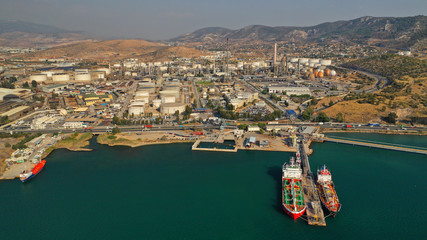 Aerial drone photo of industrial refinery of Hellenic Public Petroleum company in gulf of Aspropirgos, Attica, Greece