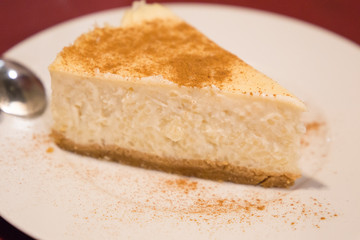Portion of sweet cheese cake on plate Spain